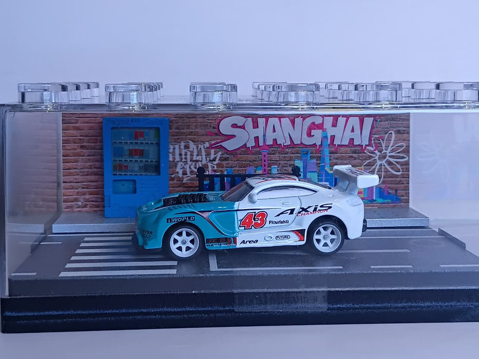 WHITE & TEAL 95577-30 1:64 RACING CAR MINATURE DIORAMA DISPLAY- PREMIUM STREET ART SCENE WITH ACRYLIC CASE